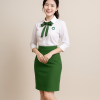 bộ đồng phục nữ áo sơ mi trắng thắt nơ và chân váy xanh