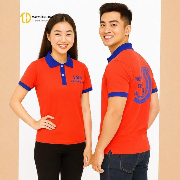 Áo nhóm lớp màu cam phối cổ bích, logo và slogan tiệp màu