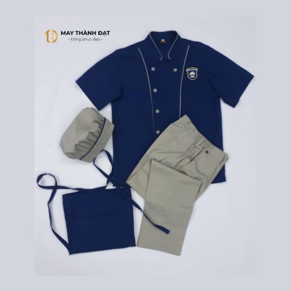 Ảnh thật bộ đồng phục bếp nhà hàng cao cấp màu xanh navy phối viền vàng – May Thành Đạt
